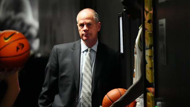 Colorado Buffaloes head coach Tad Boyle speaks with forward Tristan da Silva (23) while the Utah Utes shoot free throws during the second half at Jon M. Huntsman Center